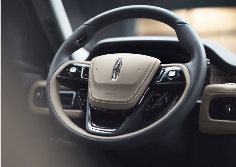 The intuitively placed controls of the steering wheel on a 2023 Lincoln Aviator® SUV | Napleton River Oaks Lincoln in Calumet City IL