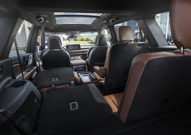 One side of the PowerFold® third-row seat and a second-row seat are folded forward in the 2026 Lincoln Aviator® SUV. | Napleton River Oaks Lincoln in Calumet City IL
