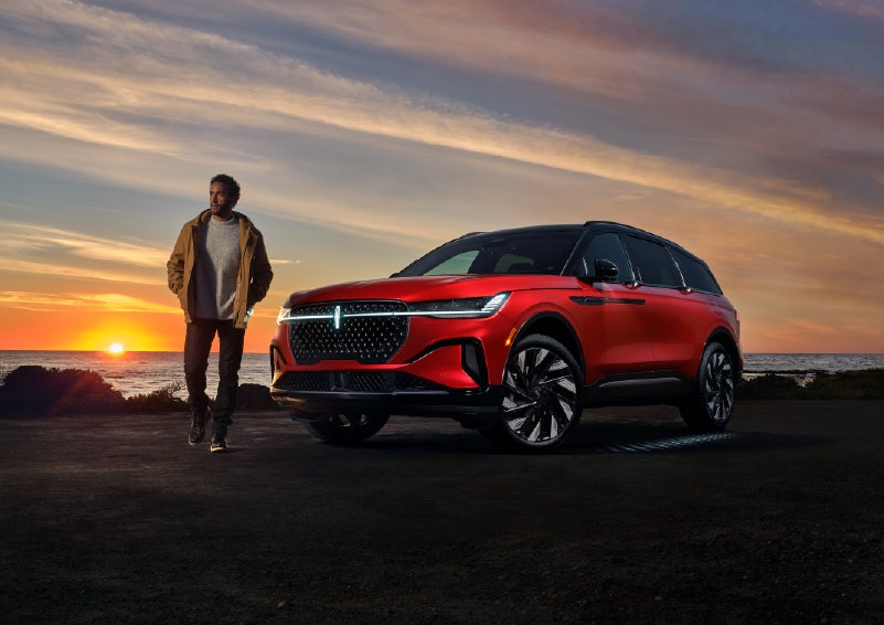 A person is shown next to a 2026 Lincoln Nautilus® SUV as the Lincoln Embrace sequence takes place. | Napleton River Oaks Lincoln in Calumet City IL
