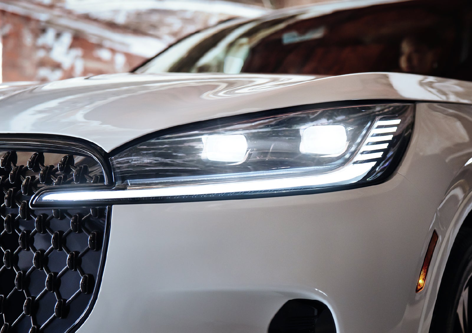 A close-up of a headlamp on the 2027 Lincoln Aviator® SUV is shown. | Napleton River Oaks Lincoln in Calumet City IL
