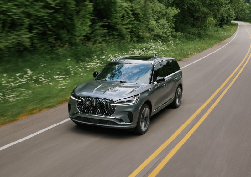 A 2027 Lincoln Aviator® SUV is being driven down a road. | Napleton River Oaks Lincoln in Calumet City IL