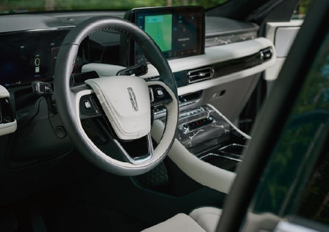 The leather-trimmed steering wheel of a 2027 Lincoln Aviator® Black Label™ SUV. | Napleton River Oaks Lincoln in Calumet City IL